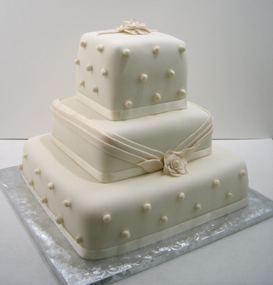 3tiered wedding cake Each tier is a different flavor of cake chocolate 